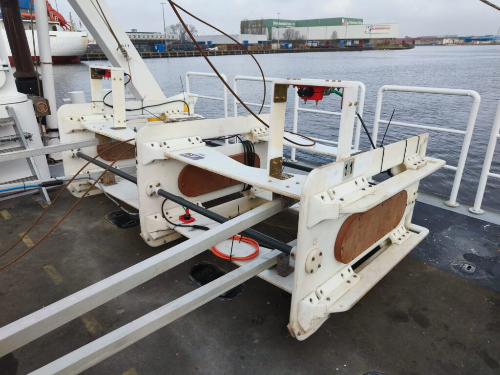 Custom offshore survey equipment mounted on an EIVA wing, on a vessel deck, prepared for subsea cable detection operations.